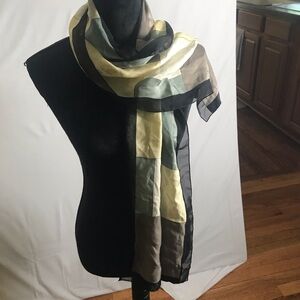 100% silk scarf in pale yellow, black, cream and green print